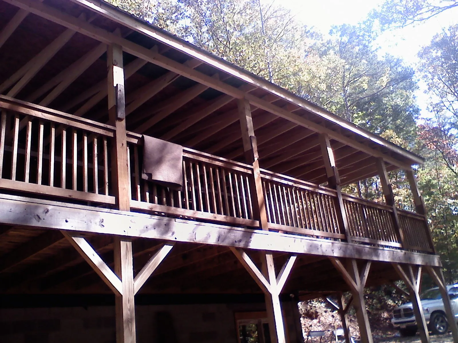 Timber framing under a new elevated porch and deck — Roof Leak Repair in Riverhead by Roofing Brothers